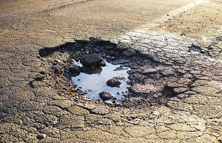 Minimizing the damage caused by potholes